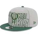 new-era-flat-brim-9fifty-draft-edition-2023-milwaukee-bucks-nba-grey-and-green-snapback-cap