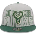 new-era-flat-brim-9fifty-draft-edition-2023-milwaukee-bucks-nba-grey-and-green-snapback-cap