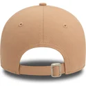 new-era-curved-brim-women-9forty-league-essential-new-york-yankees-mlb-beige-adjustable-cap-with-beige-logo