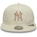 new-era-flat-brim-9fifty-original-fit-world-series-new-york-yankees-mlb-beige-snapback-cap-with-beige-logo